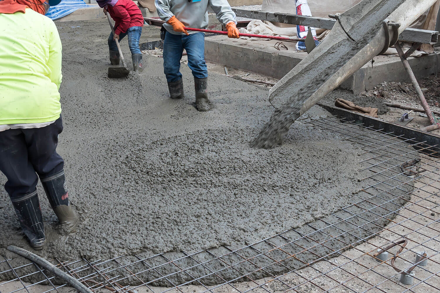 Construction worker working in concrete for a project